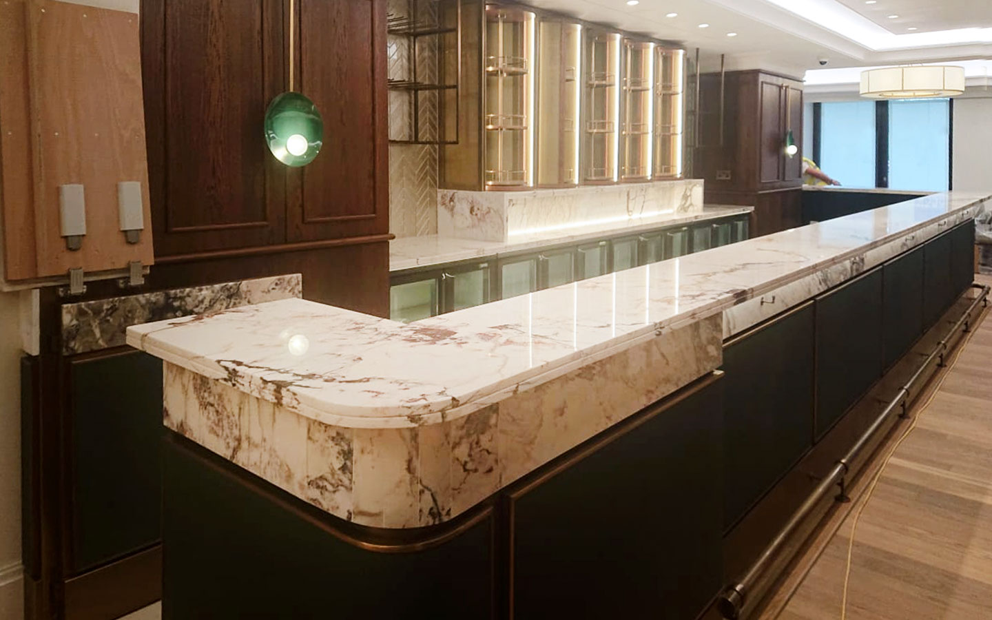The Rib Room - TCJH - Breccia Capraia marble bar tops